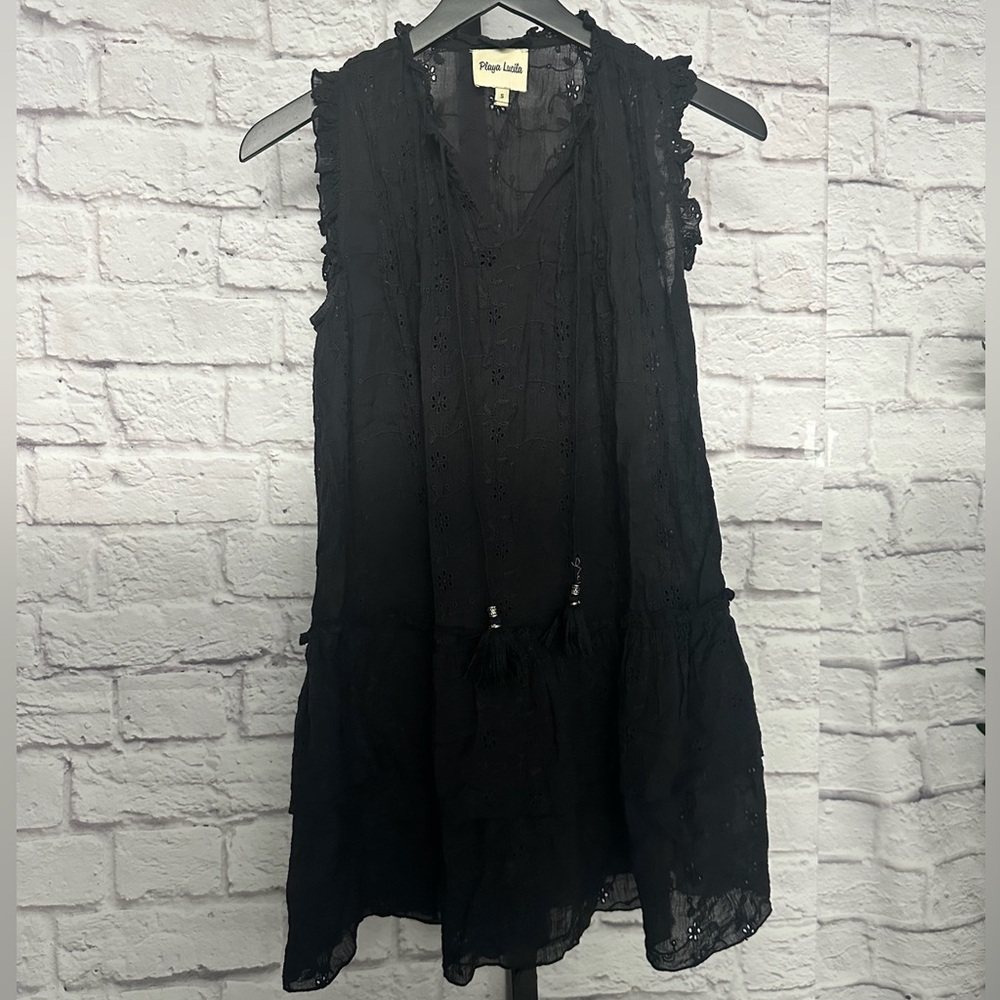 Subtle Eyelet Patterning, Delicate Ruffles, And A… - image 1